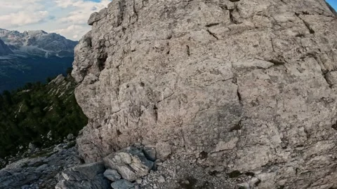 Point of view man climbing on the stone to the top of the mountain Stock Footage 248388967