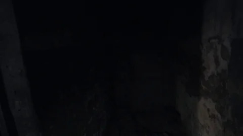 Point of view man with flashligh walking in dark corridor opens door Stock Footage 74815621