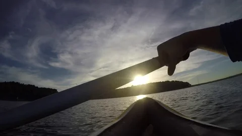 Point of view : Man Kayaking at sunset Stock Footage 82399120