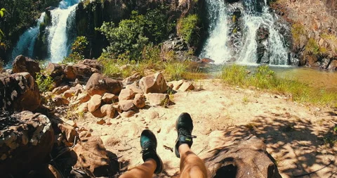 Point of view of man lying in hammock looking at waterfall. Stock Footage 162524541