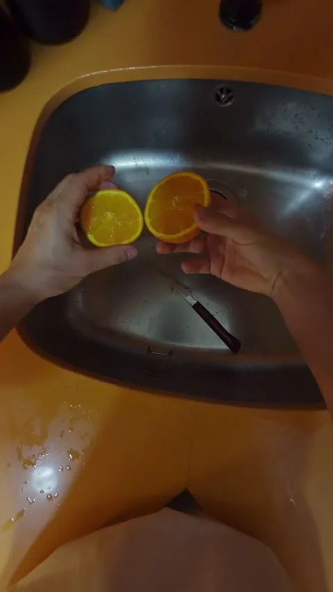 Point of view of man preparing orange juice Stock Footage 340856874