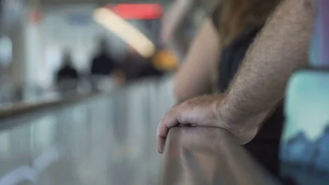 Point of view of a man riding an escalator. One hand visible. 05.10.2017 Rome Stock Footage 82903010