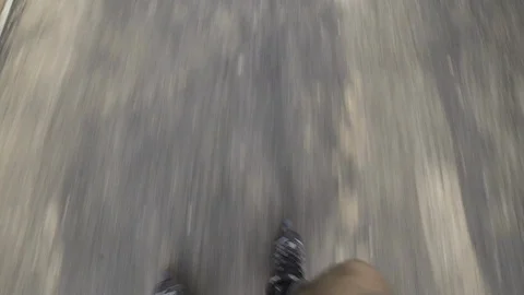 Point of view man roller skating speed in the park lake in Bucharest sunset Vídeos de archivo 98239046