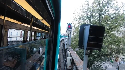 Point of view from a metro train window Paris buildings view crossing the bridge Stock Footage 105724247