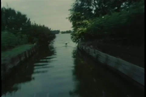 Point of view  from motorboat speeding down canal Stock Footage 11349371