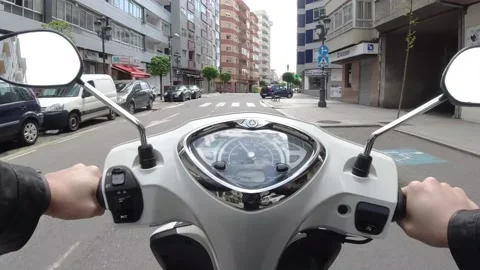 Point of view of a motorcycle driving around the city Stock Footage 131256974