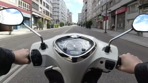 Point of view of a motorcycle driving around the city Stock Footage 131257138