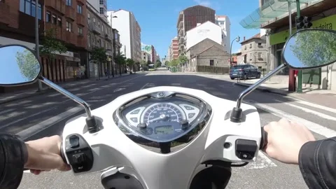 Point of view of a motorcycle driving around the city Stock Footage 131257290