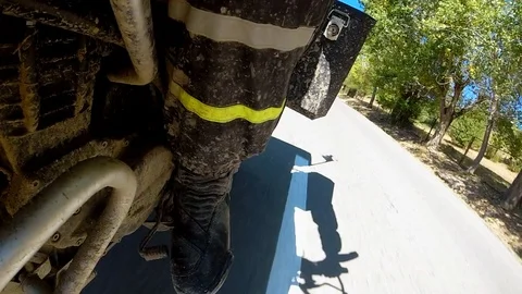 Point of view of a motorcycle riding down the road Stock Footage 88548736