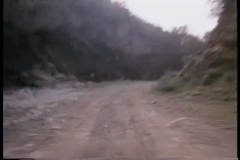 Point of view from motorcycle speeding on dirt road 스톡 동영상 11354077