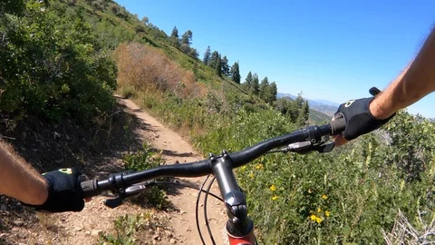 Point-of-view of mountain bikers on the Mid-Mountain trail, Park City, Utah. Stock Footage 120424037