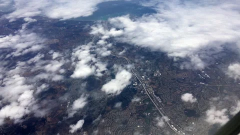 Point Of View Natural Pattern Of City Landscape Seen From Airplane Flying In Sky Stock Footage 282317740