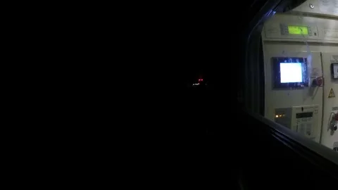 Point of view night train rushes by rail arrives and departs from platform Видео 84952082