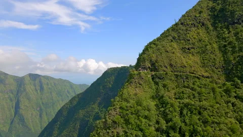 Point of view over Mafate circus Kiosk with people in Reunion island Stock Footage