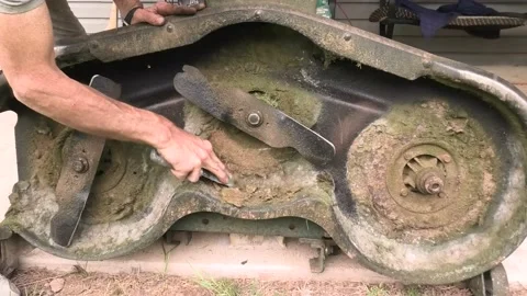 Point of View of a Person Cleaning a Mower Deck 스톡 동영상 155608129