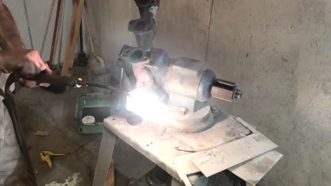 Point of View of a Person Heating a Rusty Fastener With a Torch Stock Footage 154909506