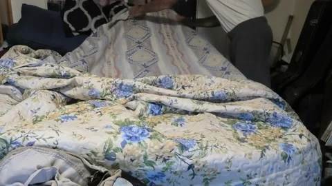 Point of View of a Person Making a Bed Stock Footage 156665123