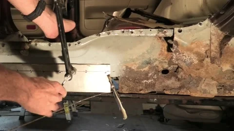 A Point of View of a Person Replacing Rusty Metal Stock Footage 155772495