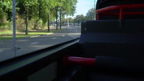 Point Of View Of A Person Sitting Inside A Driving Public Bus Looking Outside Stock Footage 130676778