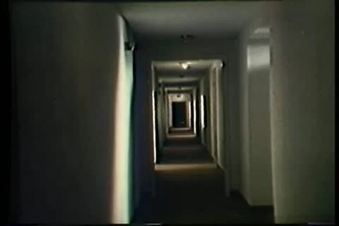 Point of view of person walking down hotel corridor Stock Footage 11354539