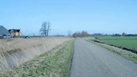 Point of view perspective driving along a dutch country road Vídeos de archivo 331188670