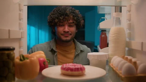 Point of view POV from inside refrigerator hungry Indian man guy male at night Stock-Footage 236405873