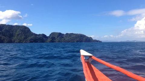 Point of view (POV) From Local Boat Approaching A Tropical Island Stock Footage