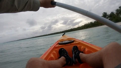 Point of view POV man kayaking on tropical holiday Video stock 107960567
