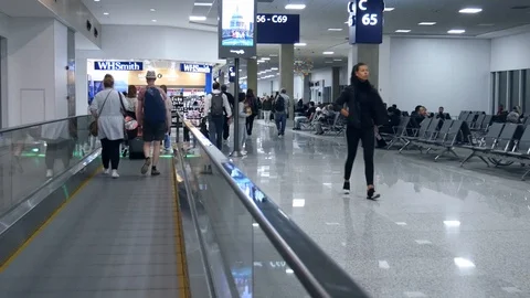 Point of view (POV) on moving walkway at Galeao Rio de Janeiro International Stock Footage 105507987