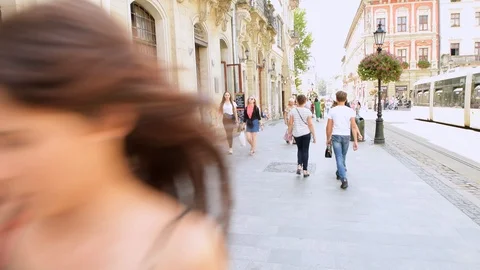 Point of view pov walking at Lviv Ukraine old town market square with people Stock Footage 112761413