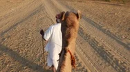 Point Of View Of A Ride Of Camel In Sand Dunes In The Desert Stock Footage