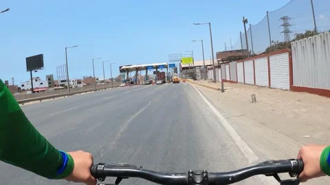 Point of view riding a bicycle and passing a toll without paying. pov on the "pa Stock Footage 143391210