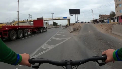 Point of view riding a bicycle on a fast track. Stock Footage 143387181