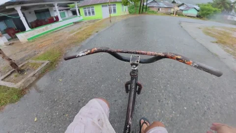 Point of View of Riding Bicycle in Rain Video stock 325417766