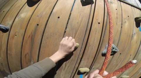 Point of view rock wall climber descending Stock Footage 44299189