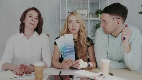 Point of view shoot. A group of experienced designers run an online consultation Stock Footage 106196901