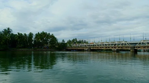 Point of view shot of a bridge while travelling in a boat, Kerala, India 動画素材 120836061