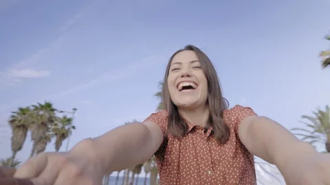Point of view shot of a happy young girlfriend dancing. Woman looking at the Stock Footage 161086797
