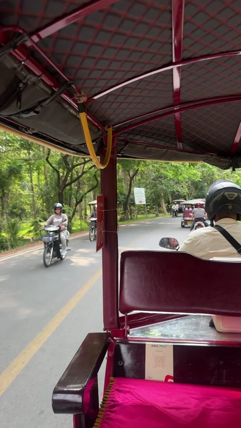 Point of view shot from inside a moving tuk-tuk on a road 스톡 동영상 341123758