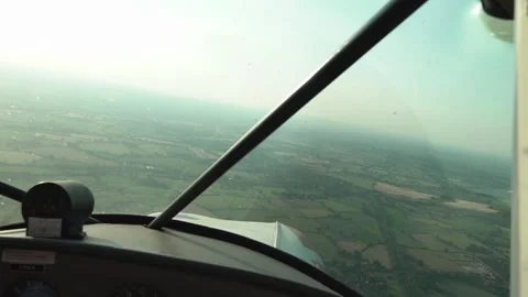Point of view shot from inside a small single engine plane Stock Footage 133504030