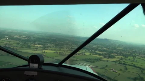 Point of view shot from inside a small single engine plane Stock Footage 133507484