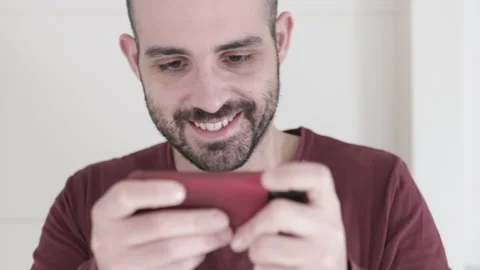 Point of View Shot Man Playing Game on his Smartphone. Cyber Gaming concept Stock Footage 168432716