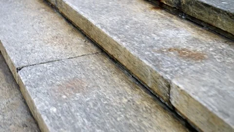 Point of view shot moving forward and ascending a very long, wide set of ancient Stock Footage 341985584