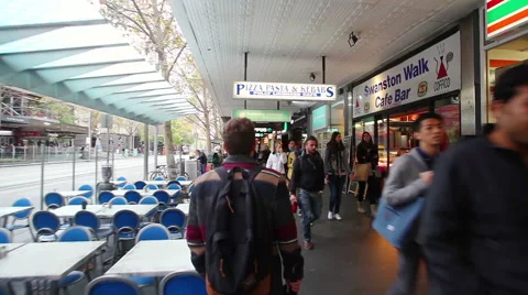 Point of view shot of people walking along a street Stock Footage 50056731