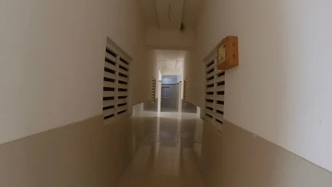 Point of view shot of running in a lobby Stock Footage 122907572