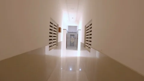 Point of view shot of running towards lift Stock Footage 122908676