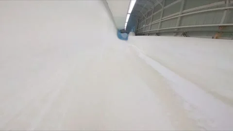 Point of view shot of a speeding bobsleigh down a frozen track Stock Footage