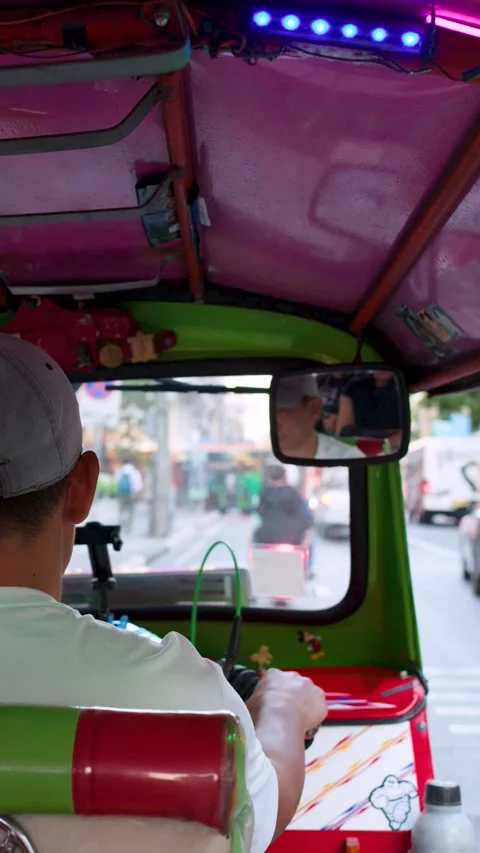 Point of View Shot of a Tuk Tuk Driver in Bangkok Stock Footage 327691765