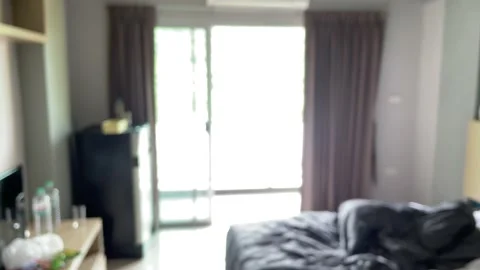 Point of view shot walking in hotel room feeling dizzy blurry and fall on ground Видео 225118059