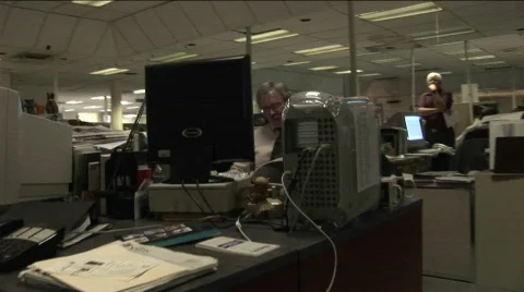 A point of view shot walking through a newsroom. Stock-Footage 556367